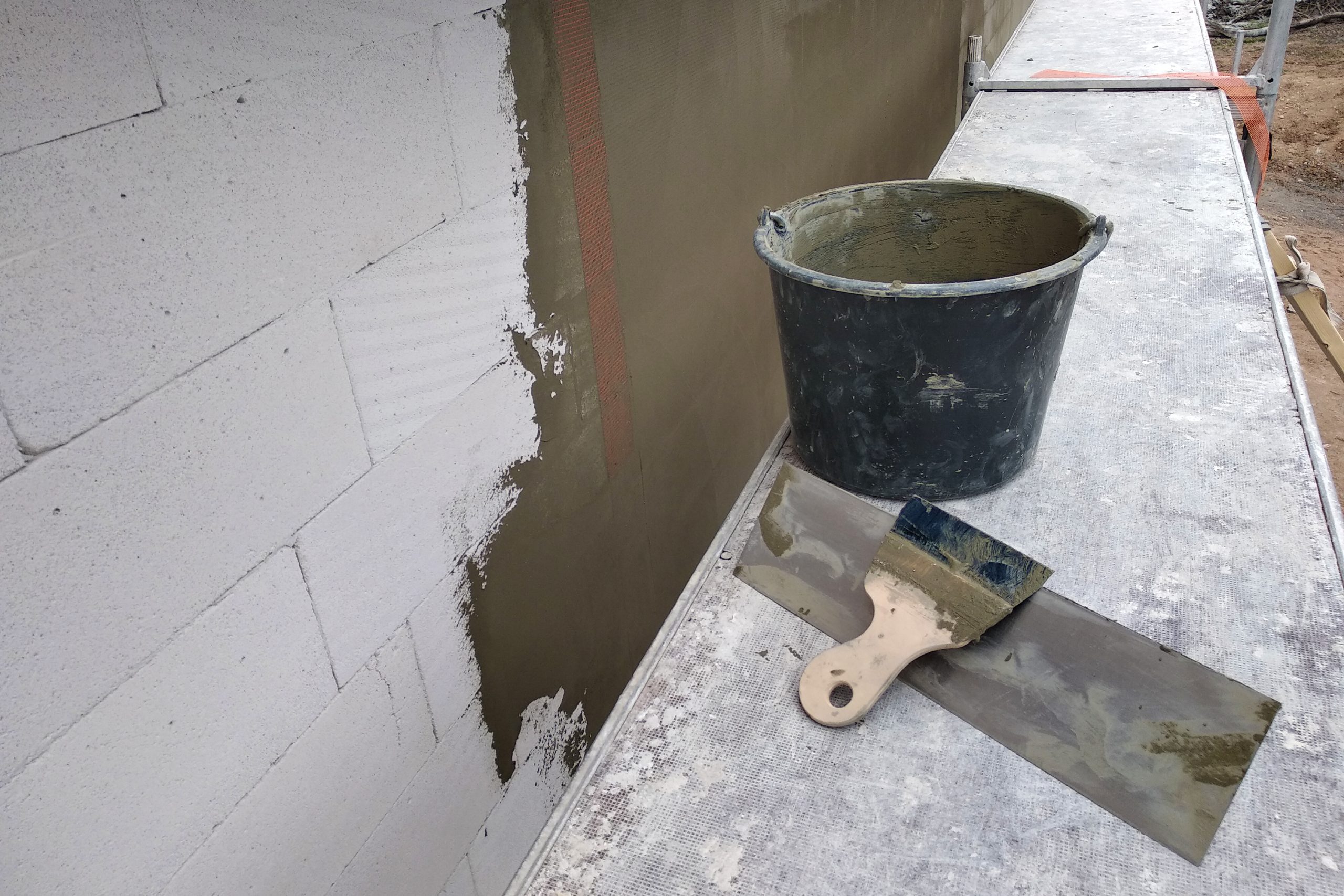 Tools and material foe covering walls with protective adhesive before finish paint.